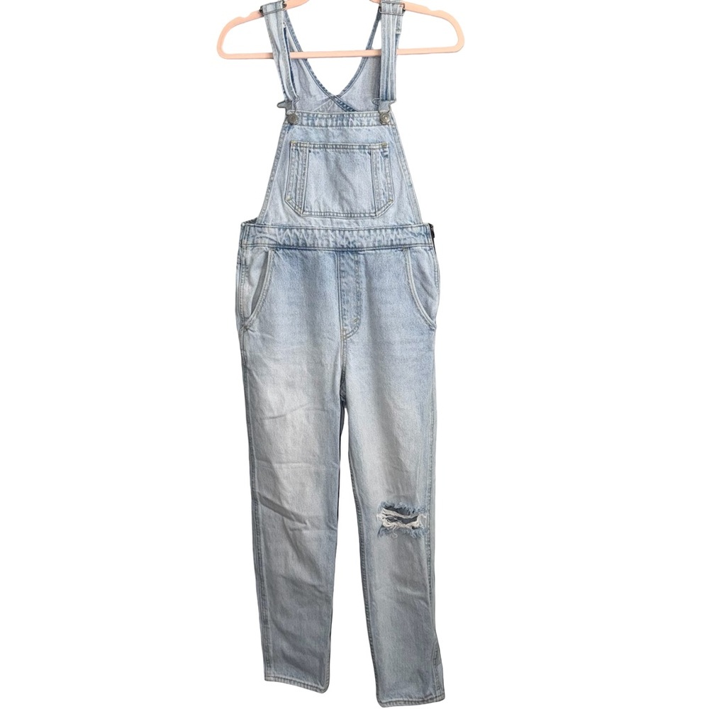 Levi’s Light blue distressed denim overalls. Size 27.